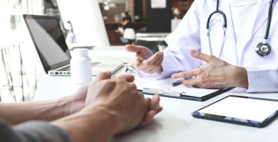 Mesothelioma doctor talking with an older couple