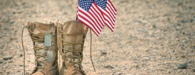 Military boots with two American flags inside