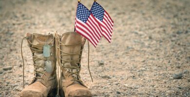Military boots with two American flags inside
