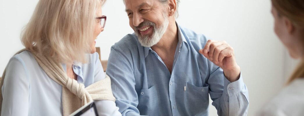 Older couple smiling at each other