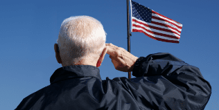 Man saluting the American flag