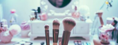 Makeup brushed in front of makeup counter