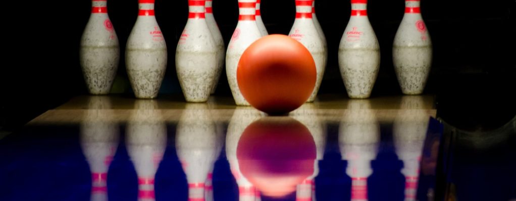 Bowling ball in front of pins