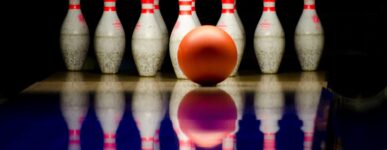 Bowling ball in front of pins