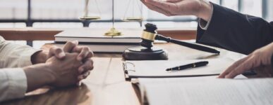 Two people meet in a legal setting