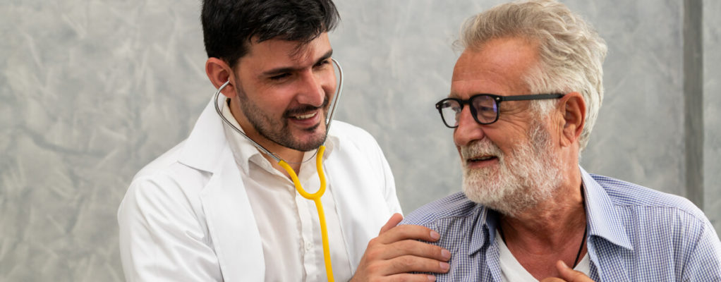 Older male patient with doctor
