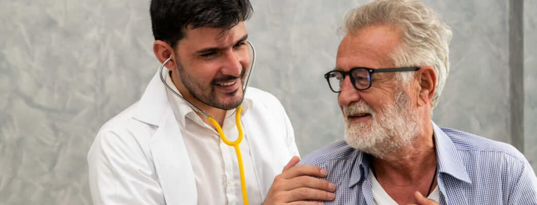 Older male patient with doctor