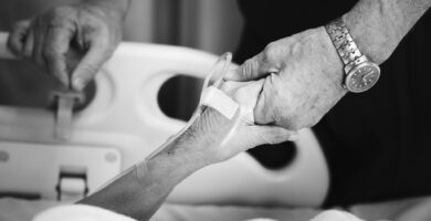 Elders holding hands