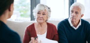 A couple speaks to an attorney about a mesothelioma lawsuit