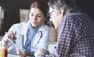 Doctor speaking to a patient about stage 1 mesothelioma