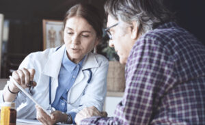 Doctor speaking to a mesothelioma patient.