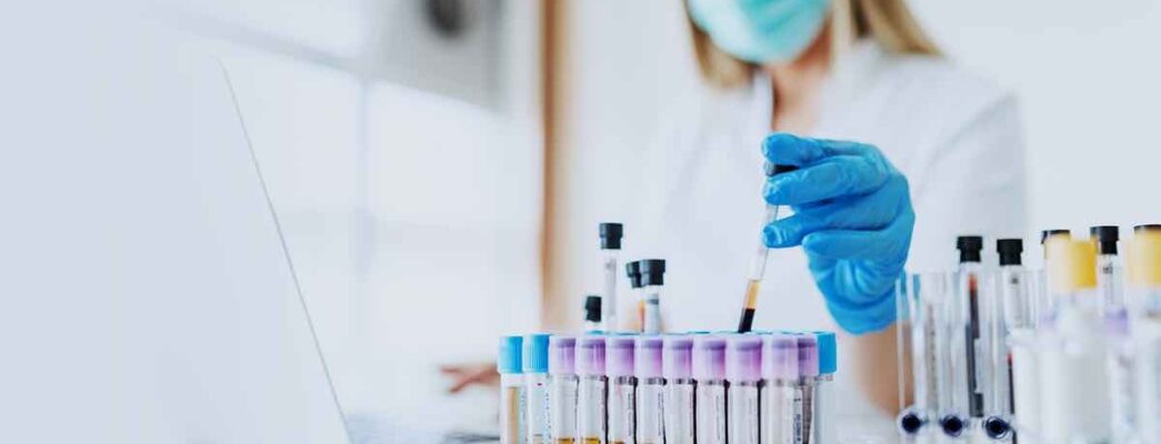 Doctor conducting cancer research in a lab.