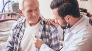 Doctor examining an elderly male patient
