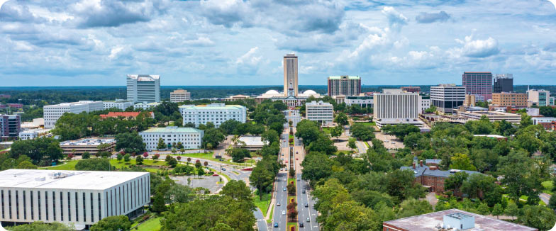 Drone view of the Florida State Capitol building in Tallahassee with the city skyline