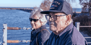 Veteran man with his wife overlooking the water