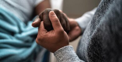 two people holding hands