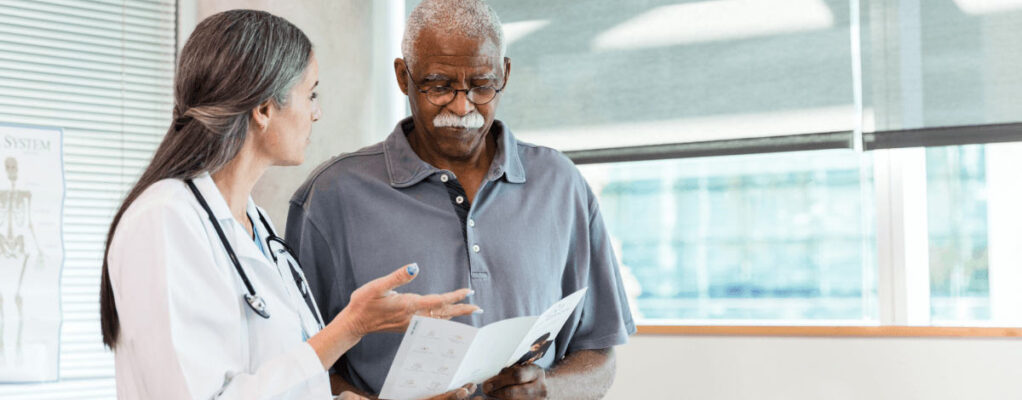 doctor discusses treatment plan with patient