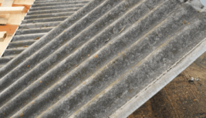 Roofing sheets that contain asbestos fibers