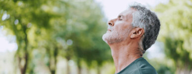 Man breathing outside