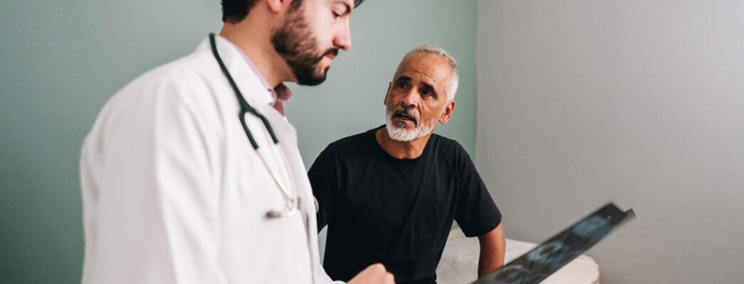 Patient talks with doctor about symptoms
