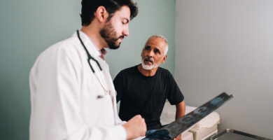 Patient talks with doctor about symptoms