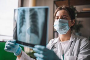 Doctor examining an X-ray