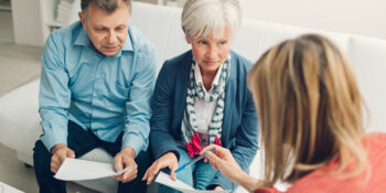 Couple talking to lawyer