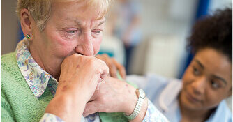 Upset woman being comforted