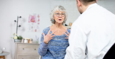 Mesothelioma patient speaking with her doctor