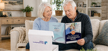 Elderly couple reading through Mesothelioma Hope's Free Mesothelioma Guide
