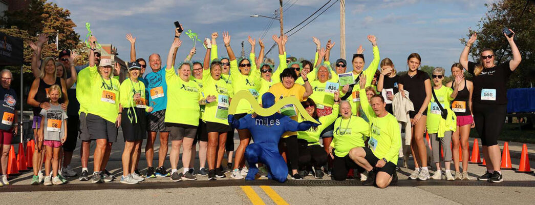 Group of participants at the starting line for Miles for Meso