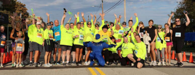 Group of participants at the starting line for Miles for Meso
